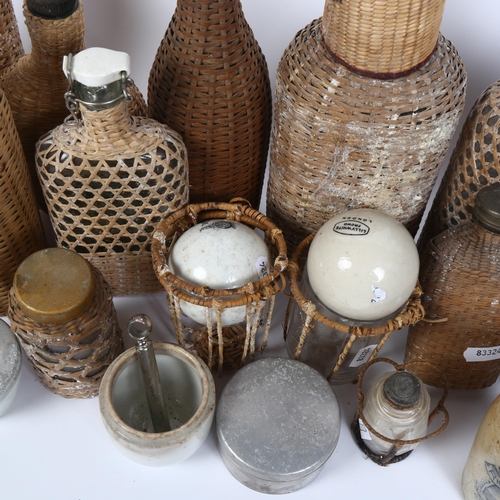 158 - A collection of various Vintage motoring picnic wicker-covered bottles and jars, a Taylor & Rolph ce... 