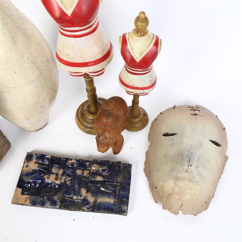 188 - An abstract pottery sculpture, 2 painted turned wood figural display stands, an African bust, studio... 