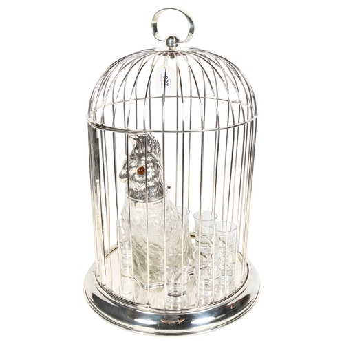 200 - A silver plated parrot design decanter and set of 8 glasses, set in a bird cage, H46cm