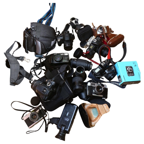 213 - A box of various cameras and equipment, including a Canon EOS 350D, a Eumig Mini 5 camera, a Petri 7... 