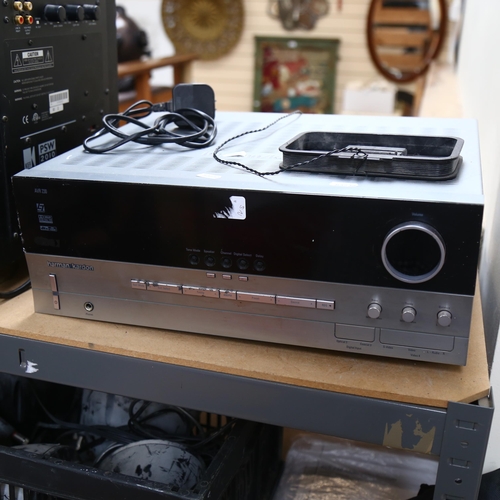 219 - A Harman/Kardon AVR230 receiver (front left foot broken off and missing), together with a KEF PSW201... 