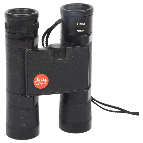 25 - A pair of Leitz Wetzlar Trinovid 10x22c binoculars, serial no. 915653, L10.5cm