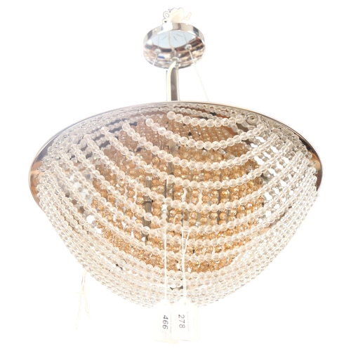 278 - A circular ceiling light fitting with chains of beads, diameter 43cm