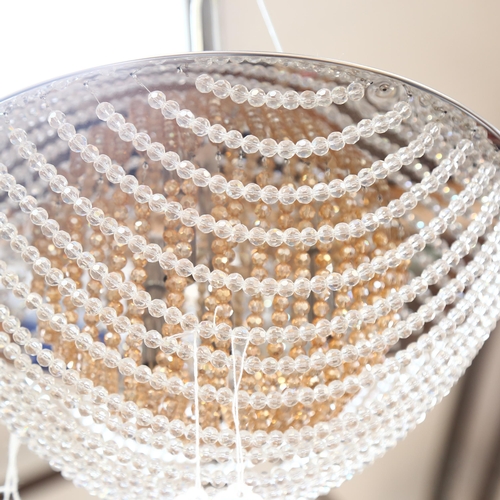 278 - A circular ceiling light fitting with chains of beads, diameter 43cm