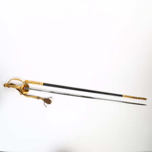 3 - Elizabeth II court sword by Wilkinson Sword Ltd, with gilt-brass hilt and shell guard, and woven sil... 