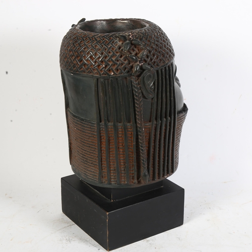 341 - A resin/composite head sculpture, copy of a Benin bronze, on wooden display stand, height 34cm