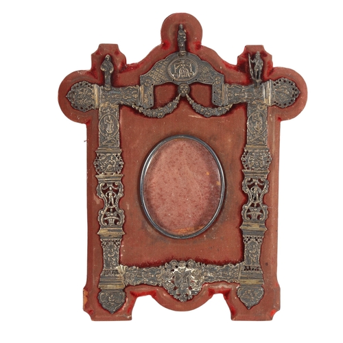 345 - An early 20th century Dutch? silver-fronted photo frame, with relief embossed and pierced swag and f... 