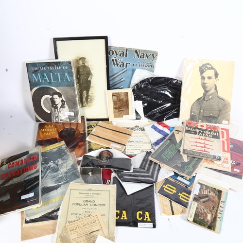 346 - A quantity of various military and Naval ephemera and related items, including Royal Navy At War, by... 