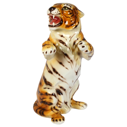 353 - Capodimonte, a large ceramic snarling tiger, maker's mark to the bottom, H56cm