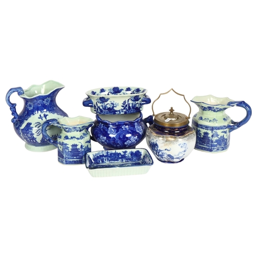 367 - A group of reproduction blue and white china, including various jugs, bowls, and other dishes, heigh... 