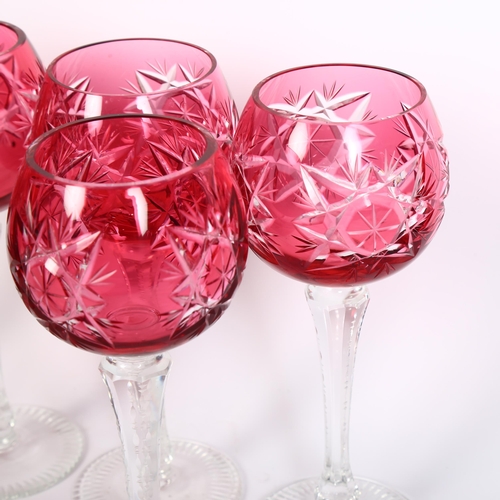 379 - A set of 6 cut Bohemian cranberry Hock wine glasses, H20cm