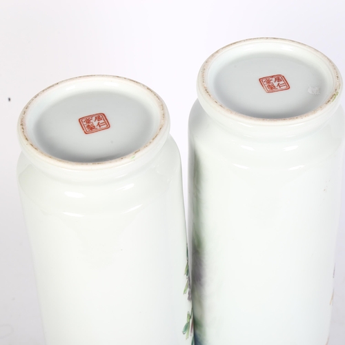 405 - A pair of Chinese Republic Period white glaze porcelain sleeve vases, with painted blossom flowers a... 