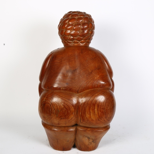 409 - **WITHDRAWN**  A novelty carved wooden statue of the figural form, H52cm