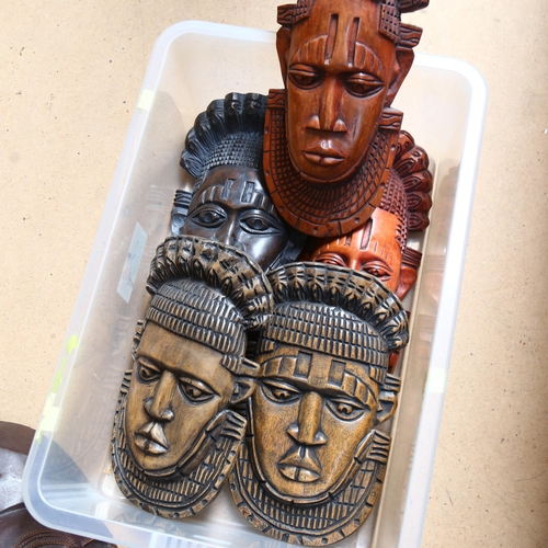 415 - A group of various carved wood African Tribal masks, tourist pieces (7)