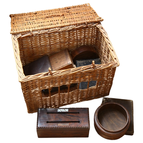 428 - A wicker hamper containing wooden boxes and empty cutlery boxes