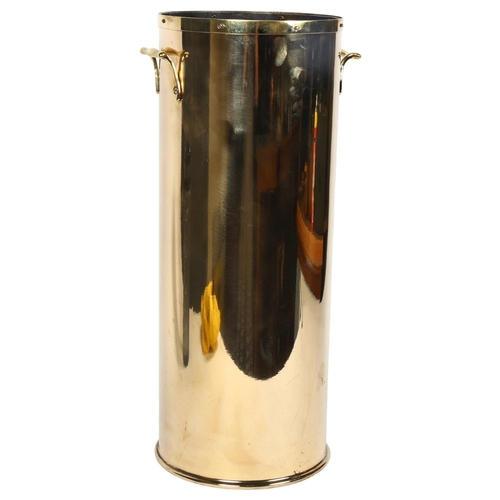 52 - A 20th century polished brass fire extinguisher converted to a stick stand, diameter 18cm, height 46... 