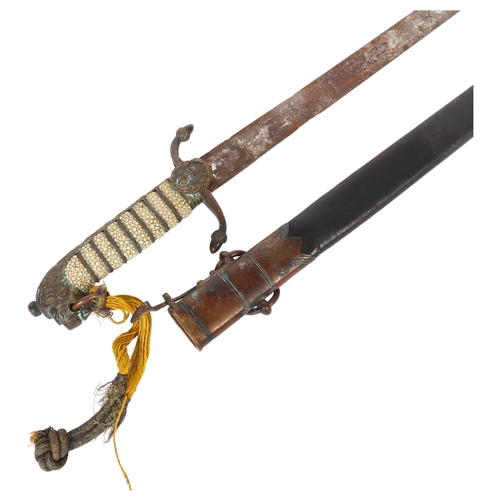 56 - A late Victorian British Royal Navy Officer's short sword, with a shagreen handle and lion mask moun... 
