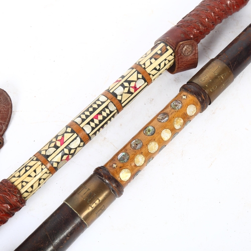 57 - A Palestine Police truncheon, turned wood and leather-mounted, with leather strap handle with brass ... 