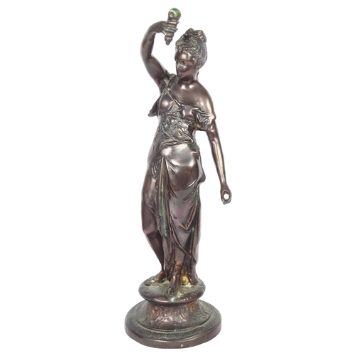 63 - A patinated bronze figure of a lady with a lamp, H55cm, unmarked