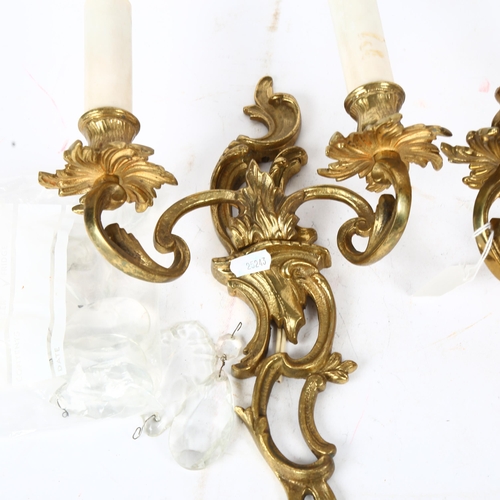 644 - A 3-branch cast gilt-brass wall sconce with foliate design, 40cm overall, and similar 2-branch wall ... 