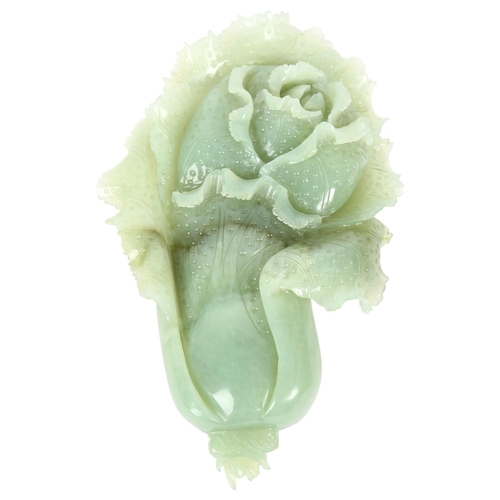 648 - A carved jadeite floral study, 25cm