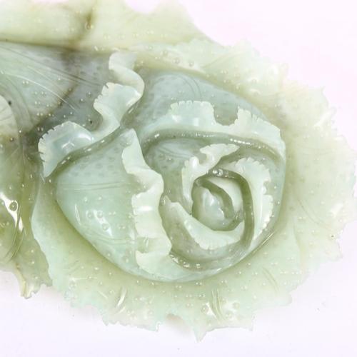 648 - A carved jadeite floral study, 25cm