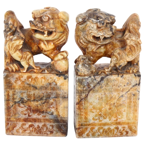 651 - A pair of carved stone Kylin figure seals, H17.5cm