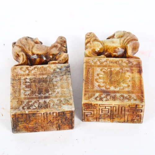 651 - A pair of carved stone Kylin figure seals, H17.5cm