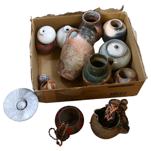 762 - Terracotta and pottery jugs, glazed vases, a Muchelney jug, beads etc