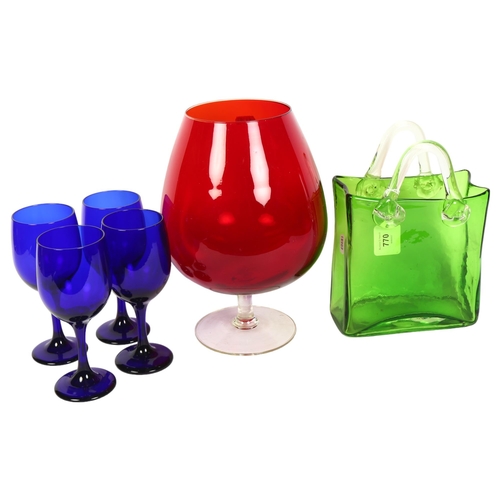 770 - A set of 4 Bristol blue wine goblets, 18cm, a green glass basket, and a large Brandy balloon