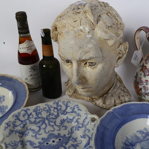 777 - A sculptured head of a boy signed Brenda H Long 1945, H26cm, an ironstone jug, bottle of wine, pair ... 