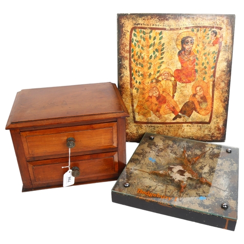 798 - A mahogany table-top 2-drawer chest, a wooden icon, and 