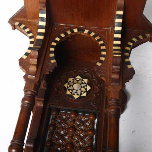 96 - A Moorish design carved and pierced wood hanging shrine, mother-of-pearl bone and ebony inlaid, L47c... 