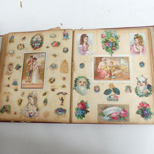 319 - A Victorian scrap album, and 2 other albums containing various Victorian postcards and greetings car... 