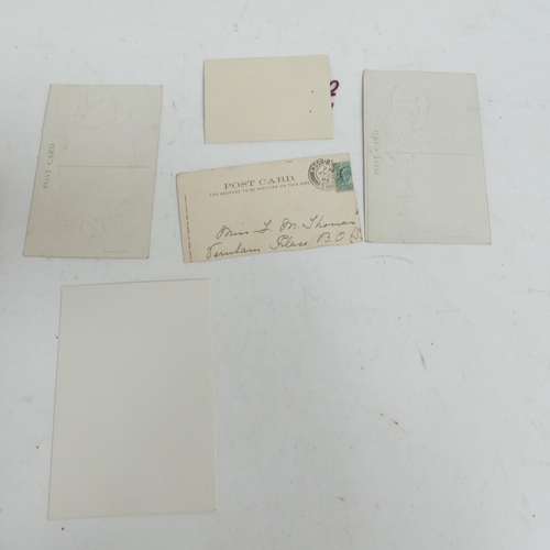 319 - A Victorian scrap album, and 2 other albums containing various Victorian postcards and greetings car... 