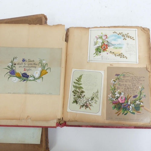 319 - A Victorian scrap album, and 2 other albums containing various Victorian postcards and greetings car... 