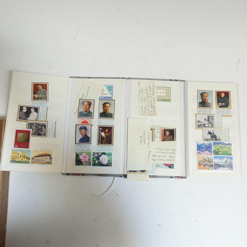 85 - An album of Chinese First Day Covers in presentation box, and an album of Chinese postage stamps