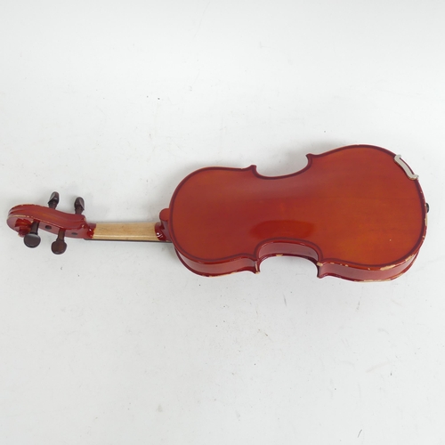 256 - A half-size violin, with label reading 