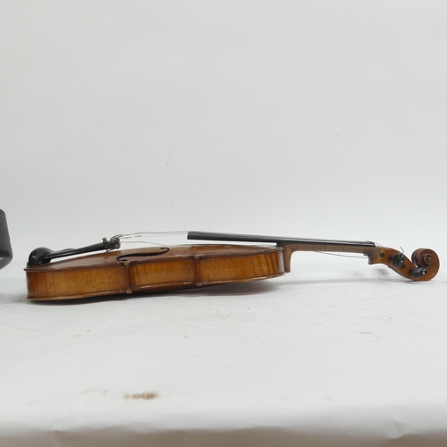 259 - A 19th century violin, with hardshell case and associated bow, violin length 14