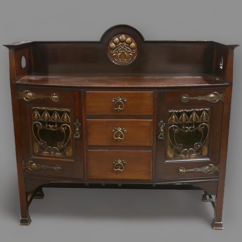 82 - A Liberty & Co Arts and crafts sideboard, manufactured circa 1900, mahogany with planished copper fi... 