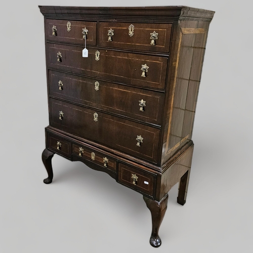 193 - A George III walnut chest on stand raised on cabriole legs, width 94cm, height 127cm