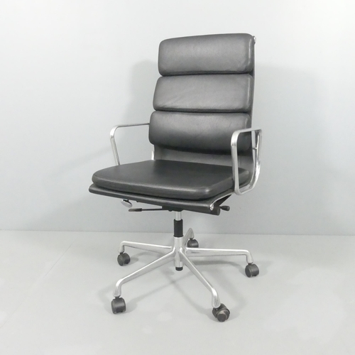 VITRA - a mid-century black leather upholstered EA 219 swivel desk chair by Charles and Ray Eames, with impressed maker's mark.