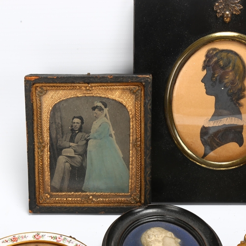 104 - A group of miniature portraits, silhouettes daguerrotype photographs, including a pair of prints in ... 