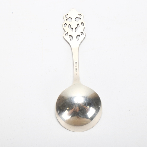 112 - A Norwegian silver Caddy Spoonwith Art Nouveau floral handle, stamped 830s  NM 317