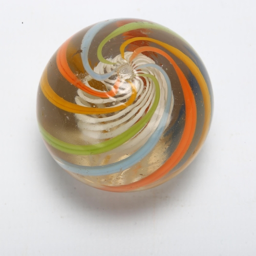 113 - A large Victorian glass marble, with coloured swirl and latachino twist interior, diameter approx 4c... 