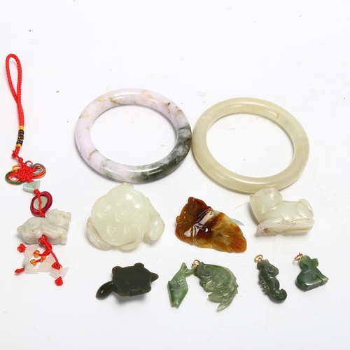 116 - A group of Chinese jade and hardstone carvings, bangles and pendants