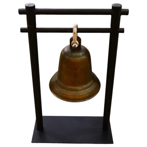 128 - A heavy gauge bronze bell, probably late 19th or early 20th century, height 33cm, diameter 30cm, on ... 