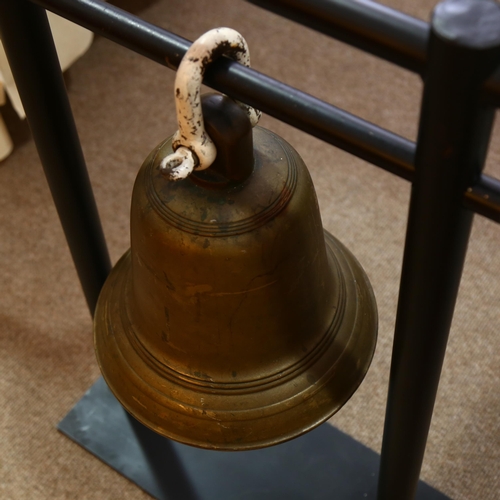 128 - A heavy gauge bronze bell, probably late 19th or early 20th century, height 33cm, diameter 30cm, on ... 