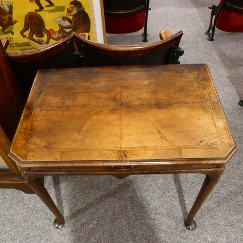 13 - George II Period walnut side table, the feather banded and quarter veneered canted top above a singl... 