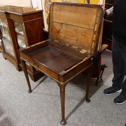 13 - George II Period walnut side table, the feather banded and quarter veneered canted top above a singl... 